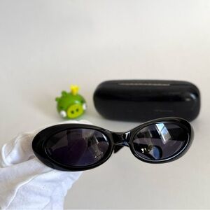 Black Gucci Slim Oval Sunglasses